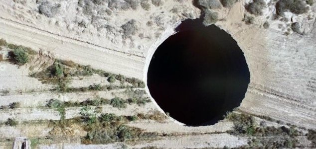Enormous sinkhole swallows up the ground in Chile News-chile-sinkhole