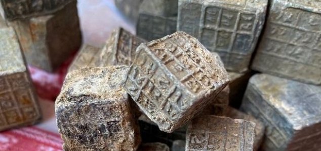 Mysterious inscribed cubes discovered in river News-cubes-river