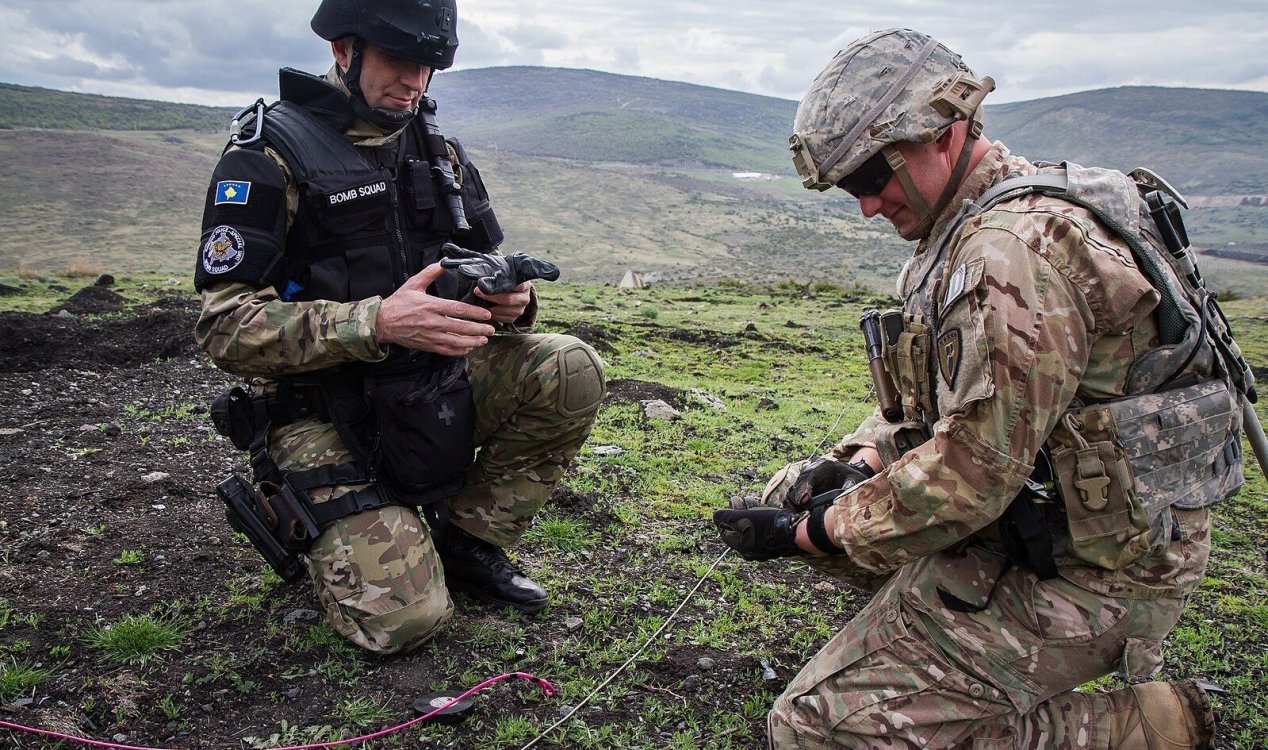 Bomb disposal experts in Kosovo.