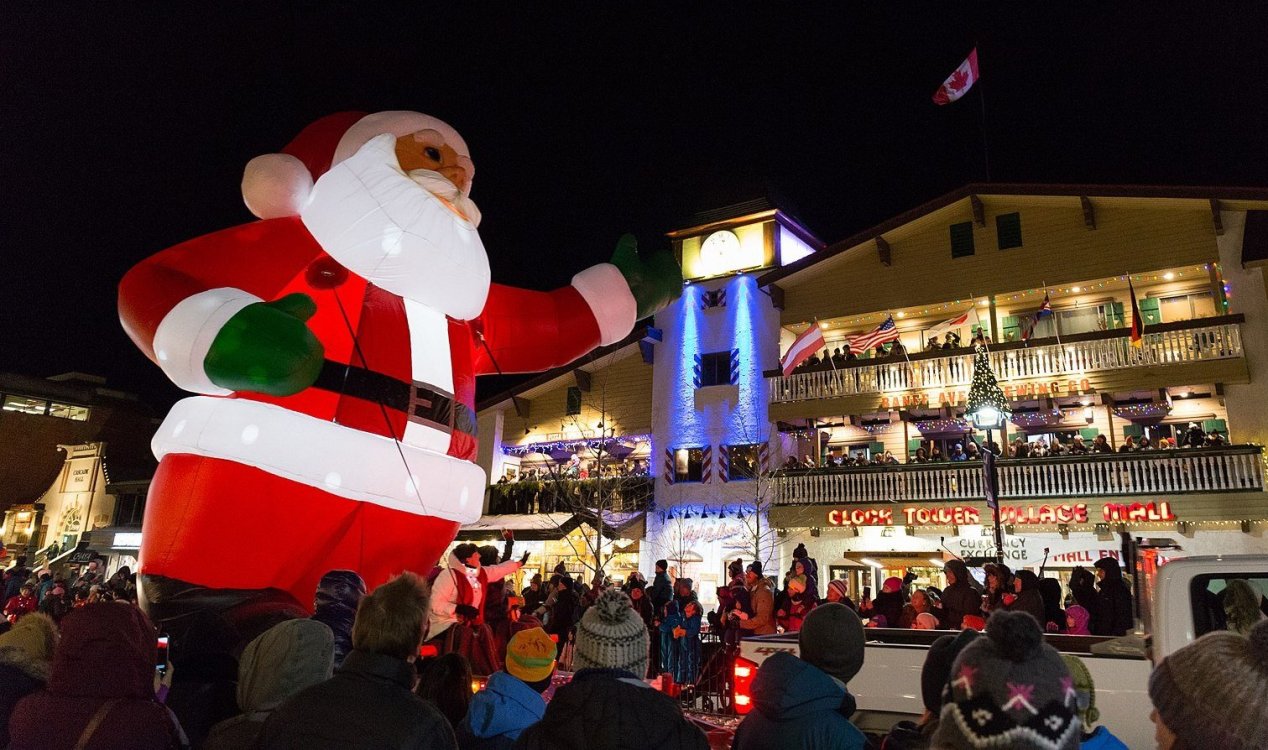 Inflatable Santa Claus at a parade in Canada.