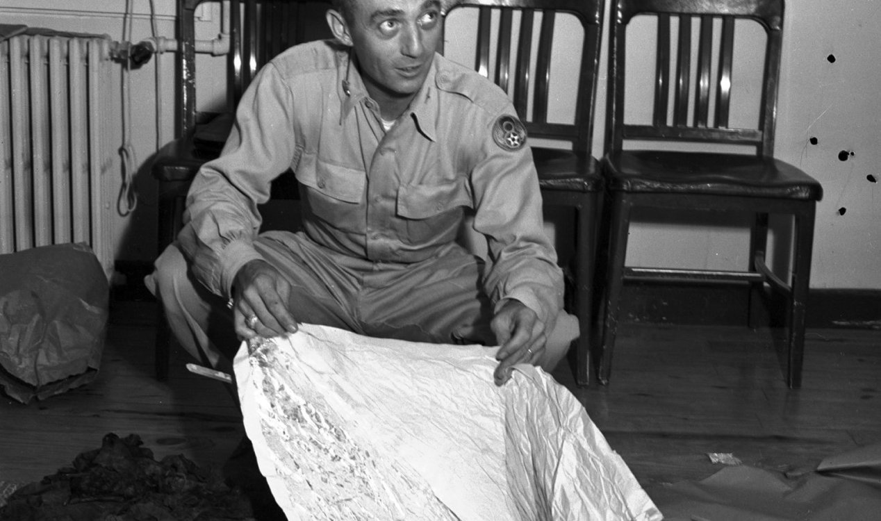 Major Jesse Marcel with the Roswell debris.
