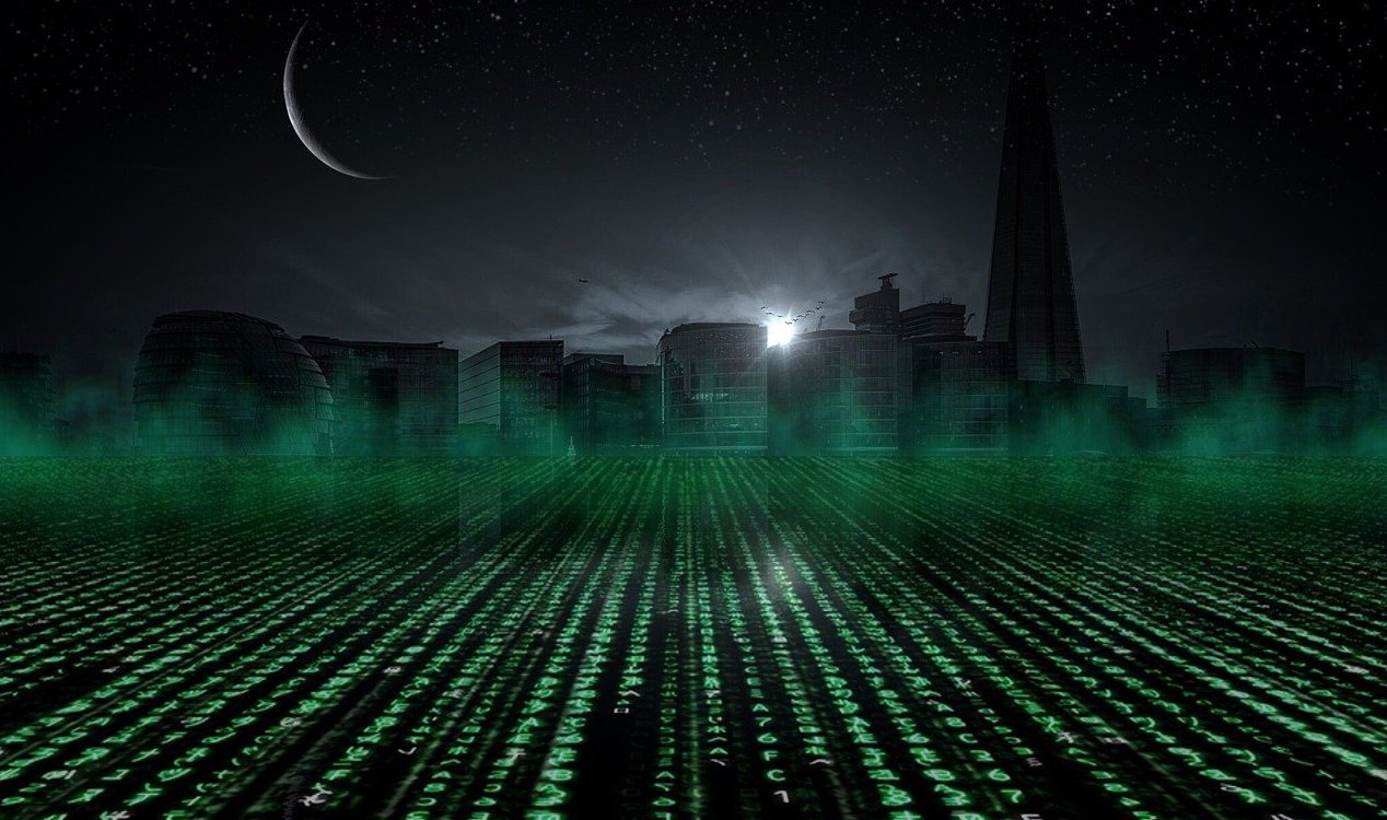 Matrix code streaming toward a city skyline at night.