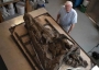 David Attenborough with a pliosaur skull.