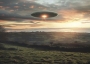 UFO over countryside.