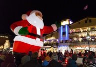 Inflatable Santa Claus at a parade in Canada.