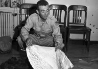 Major Jesse Marcel with the Roswell debris.