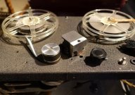 A reel-to-reel tape recorder.